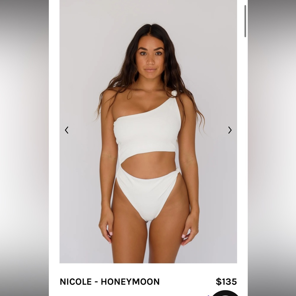 BRAND NEW with tags white, Skatie one piece!!
